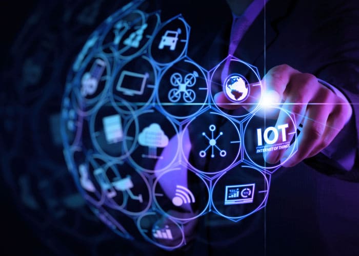 A person touching a glowing screen