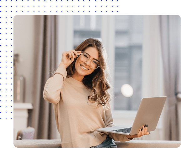 A woman holding a laptop